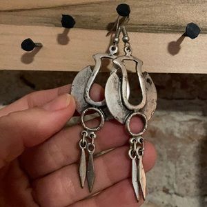 Handmade silver earrings purchased from Etsy